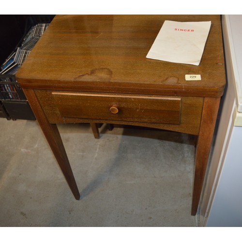 213 - Singer Sewing Machine in Cabinet/Table with Instructions