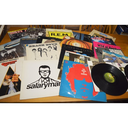 74 - A Good Selection of Vinyl LPs including R.E.M., Joe Cocker, Leonard Cohen, Ian Dury, Plus Partial Co... 