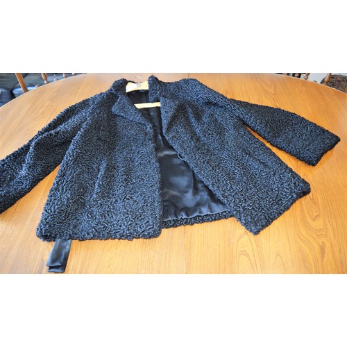 142 - A Ladies' Astrakhan Short Jacket (Size Unknown - possibly Small to Medium)