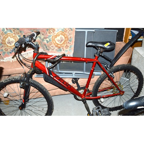 An Apollo Feud Men s Mountain Bike in Metallic Red with Shimano