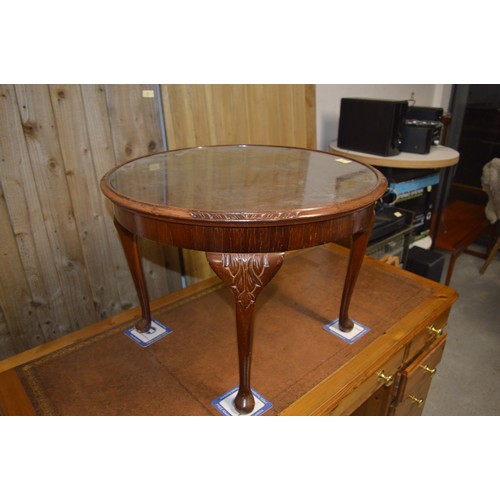 4 - Mahogany Glass-Topped Occasional Table having Cross Banding and on Cabriole Legs - 2 Foot Diameter