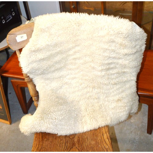 28 - A Small Pure Sheepskin Rug approx. 24