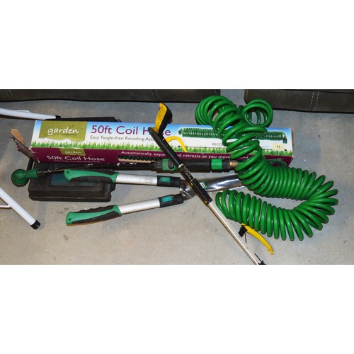 71 - Two Easy Tangle-Free Recoiling Coil Hoses, a Pair of Extending Hedge Shears, and a Cased Black and D... 