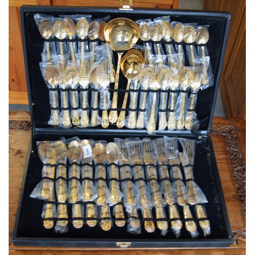 9 - An Ekco Eterna Gilt Finished Canteen of Cutlery (Six-Place Setting)