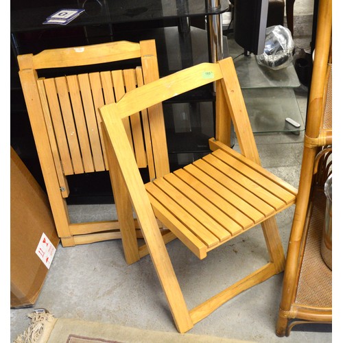 17 - Two Folding Lightwood Chairs and a Drop-leaf Dining Table