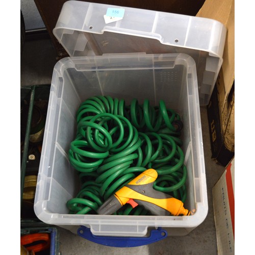 156 - A Recoiling Coil Hose with Gun by Hozelock Plus a Clear Plastic Container