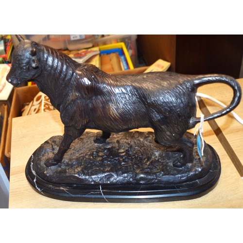 239 - A Bronze Bull. Signature indistinct. Length approx. 14