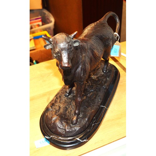 239 - A Bronze Bull. Signature indistinct. Length approx. 14