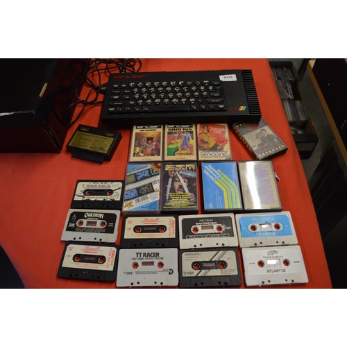 127 - A Sinclair ZX Spectrum+ Home Computer and approx 35 Cassette Games, Plus a Competition Pro Joystick ... 