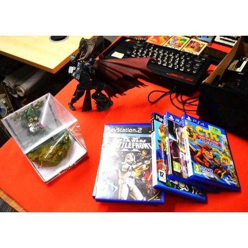 126 - Assorted PS4 and PS2 Games, Plus a Spawn Action Figure, Plus a Wheedo's Ashtray