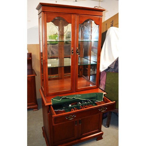 165 - A White & Newton Mid-Century Cherry Wood Cabinet having Glazed Back-Lit Display Top over a Base havi... 