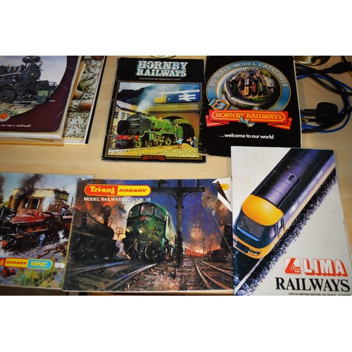 120 - Six OO Gauge Model Railway Catalogues:
Hornby: 1970, 1972, 1980, 1982
Lima 1983/1984
Bachmann (Inter... 