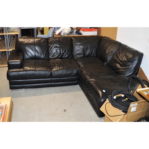 131 - A Black Leather Corner Sofa (Comes in Two Pieces) - Requires Two Bun Feet which are Missing