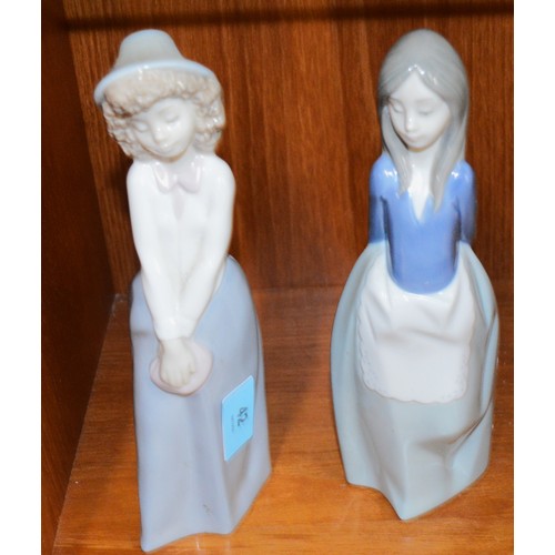 53 - Two Nao Figurines:  Girl with Hat and Girl with Apron