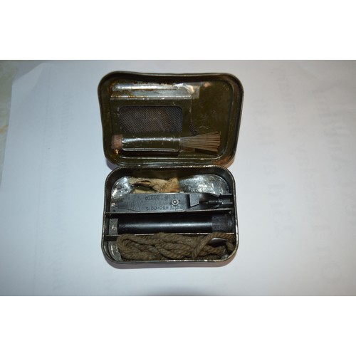 2 - A British Army Gun Cleaning Kit housed in Original Drab Olive Colour Tin