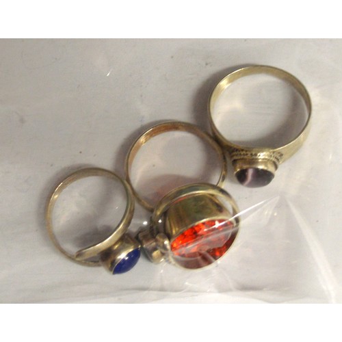 198 - Four Ladies' Arts and Crafts Style Silver Rings - Total Weight 25 Grams