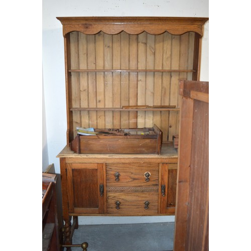 16 - Medium Oak Dresser having Two Central Drawers (with Carved Detail) Flanked by Two Cupboards to Base,... 