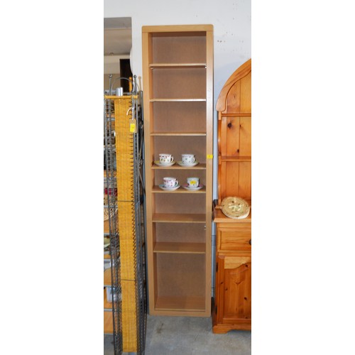 8 - A Slimline Tall Lightwood Bookcase with adjustable shelves approx. 7' High