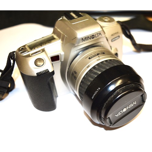 15 - A Minolta 404 si 35mm SLR Camera with a 35-80 mm Lens