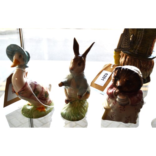 4 - Royal Albert Figures:-Peter Rabbit, Jemima Puddleduck and Mrs Tiggy Winkle