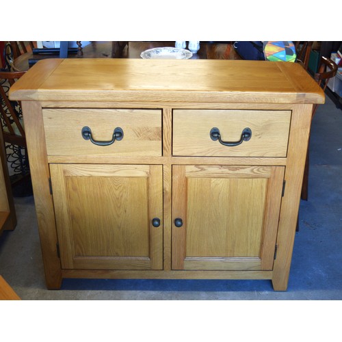 131 - Oak Sideboard having Two Drawers Over Two Cupboards 42