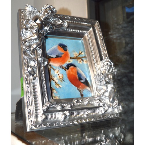 139 - Silver Coloured Picture Frame with Bas Relief Cherubs
