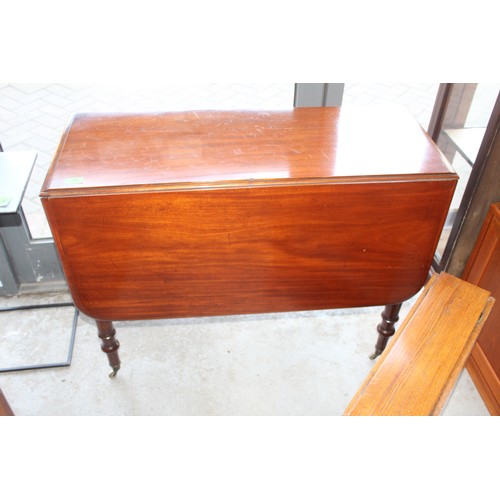 59 - A Late Victorian Drop-Leaf Table with Turned and Tapered Legs terminating in Brass Castors