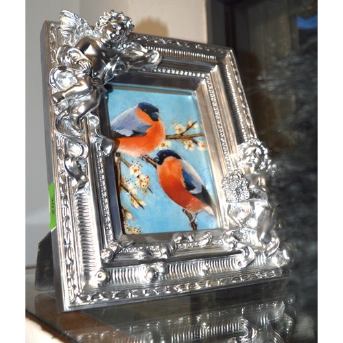 216 - Silver Coloured Picture Frame with Bas Relief Cherubs