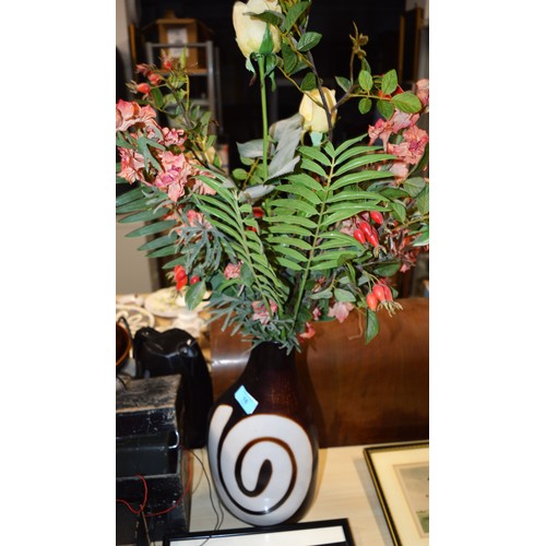 16 - A Vase with Brown and Beige Swirl Pattern - filled with Assorted Faux Flowers