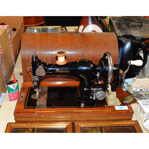 26 - Cased Selfridge Provincial Stores Durance Sewing Machine with Ceramic Handle on a Tunbriodge-ware ba... 