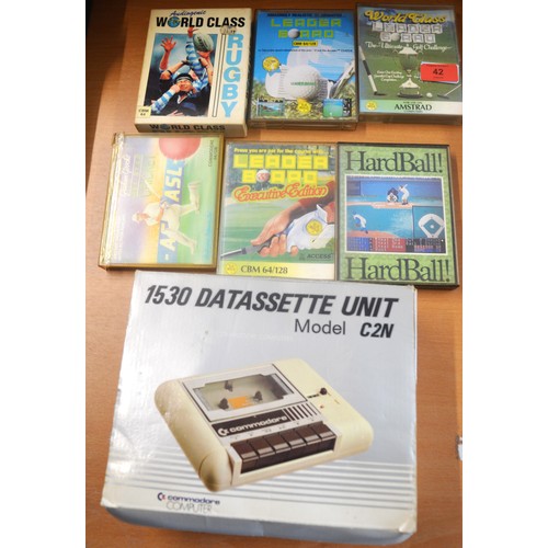 76 - A Boxed Commodore 1530 Datassette Unit Model C2N with Six  Game Cassettes, including Rugby, Golf and... 