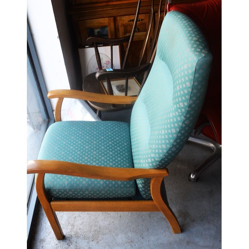 216 - A Parker Knoll Armchair (Ref. No. PK M 1450-66) upholstered in Green Fabric