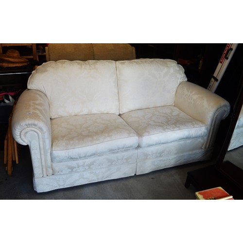 110 - Good Solid Quality Three/Four-Seater Sofa covered in a Cream Fabric, on Casters - Measures 2 Metres ... 