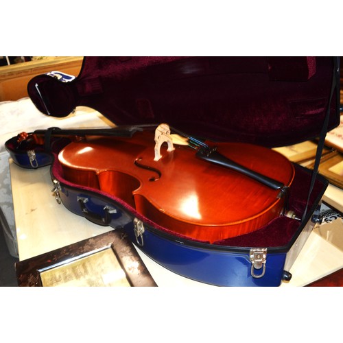 127 - A Westbury Full Size Cello with Bow in a near new Teal Blue Case (4 pictures)