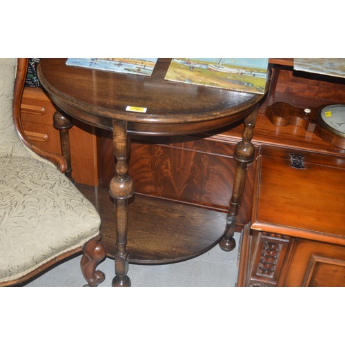 103 - An Oak Demi-Lune Hall Table with Bulbous Legs and Under-Shelf