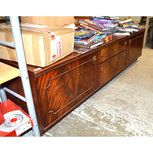 145 - Mahogany Media Unit with two central drawers flanked by two cupboards. 74