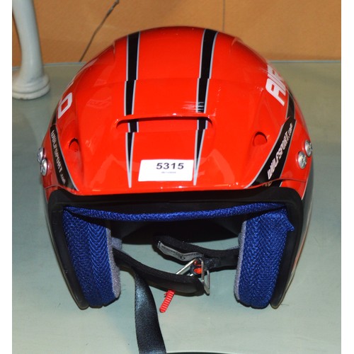 52 - An AIRFLO Large Size Motor-cycle Helmet in Red