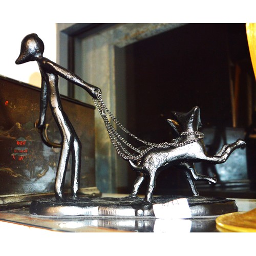 205 - A Hollow-Cast Metal Figural Statue (a Woman with Two Dogs on Leads)