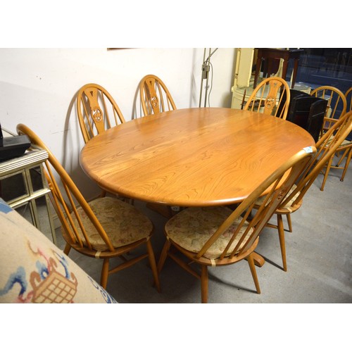 36 - Ercol Oval Dining Table (approx 66