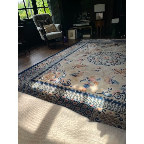 33 - Large Chinese Rug (ex John Lewis) having Cream Ground and Blue and Pink Design - approx 8 Ft x 10 Ft