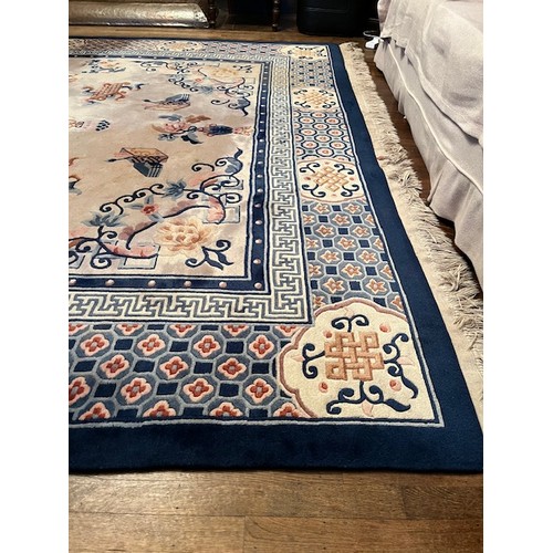 33 - Large Chinese Rug (ex John Lewis) having Cream Ground and Blue and Pink Design - approx 8 Ft x 10 Ft