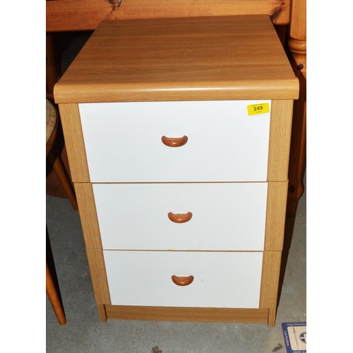 63 - One Three-Drawer Bedside Chest with white Faced drawers