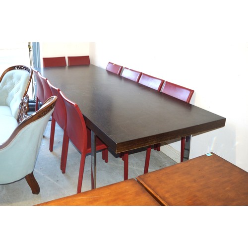 7 - Very Large Ebonised Dining Table on Two Metal Square Bracket Supports, Plus Ten Dining Chairs in Red... 