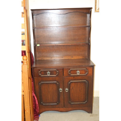 38 - Dark Oak Dresser having Plate Rack Shelving to Top, and Two Drawers and Two Cupboards to Base