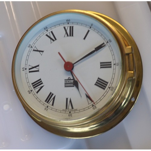 172 - A Brass Clock made by Sewills of Liverpool, having a Bevel Glass Face, but without Plinth/Mount