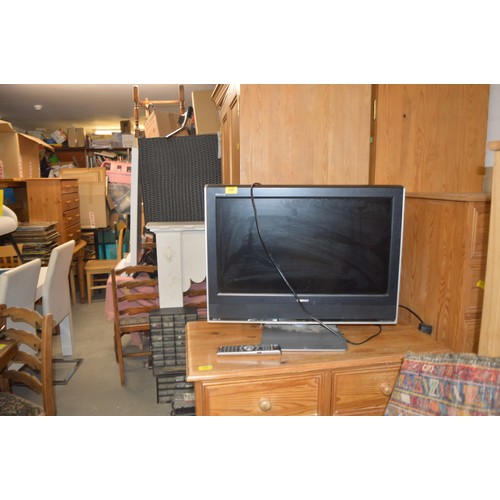 240 - Toshiba Flat Screen Television and Remote Control