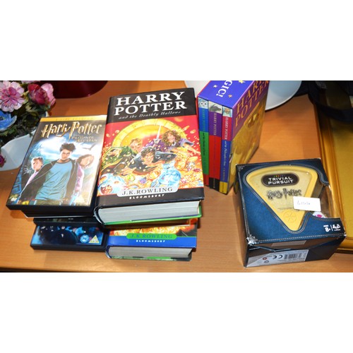 211 - A Selection of Harry Potter Items including Trivial Pursuit Game, Hardback and Paperback Books and D... 