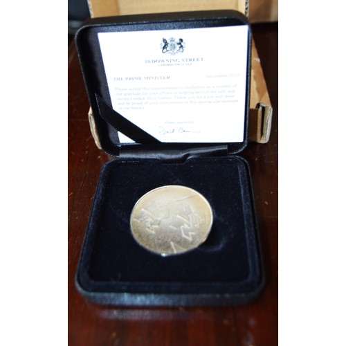 296 - A Boxed Royal Mint 2012 London Olympics Commerorative Medallions Produced by the Royal Mint with Num... 