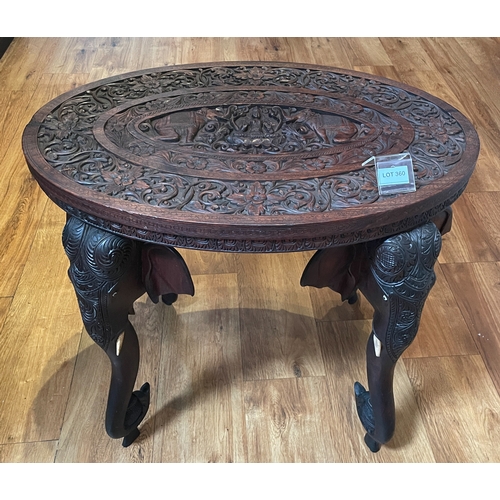 360 - Heavily carved oriental elephant legged table approx 69cm wide x 58cm tall