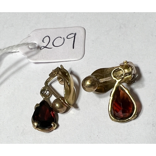 209 - Pair of gold earrings